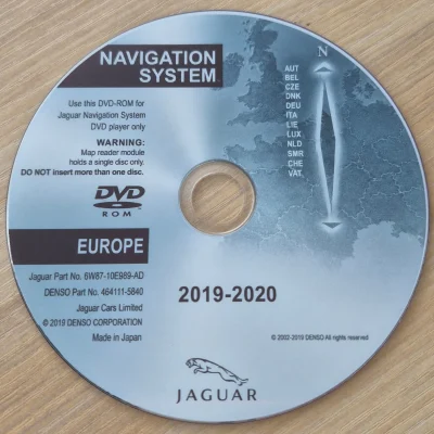 DVD-ROM labeled Navigation System Europe for Jaguar, showing a map and compass design on a silver disc.